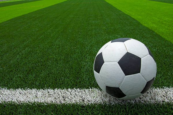 soccer ball or football on soccer field soccer ball or football on soccer field